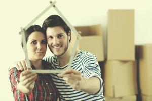 Young couple moving in new house photo