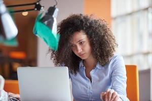 young  business woman at office photo