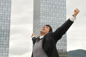 Photo of happy winner businessman  screaming from joy