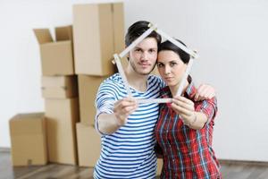 Young couple moving in new house photo