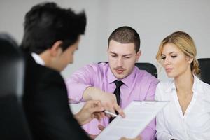 Group of young business people at meeting photo