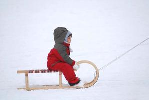 sledding on snow photo