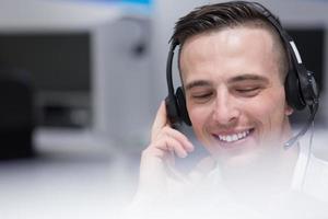 male call centre operator doing his job photo