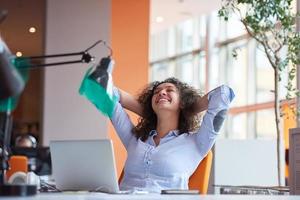 young  business woman at office photo