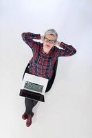 top view of young business woman working on laptop computer photo