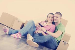 Young couple moving in new home photo