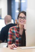 startup business, woman  working on desktop computer photo