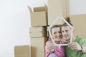 Young couple moving in new home photo