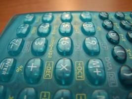 Calculator on table photo