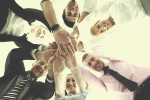 business people group joining hands photo