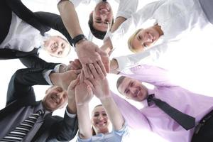 business people group joining hands photo