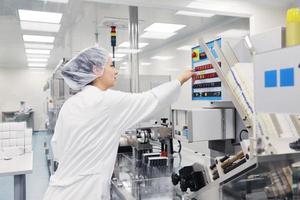 woman worker in pharmacy company photo