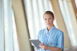 female doctor with tablet computer photo