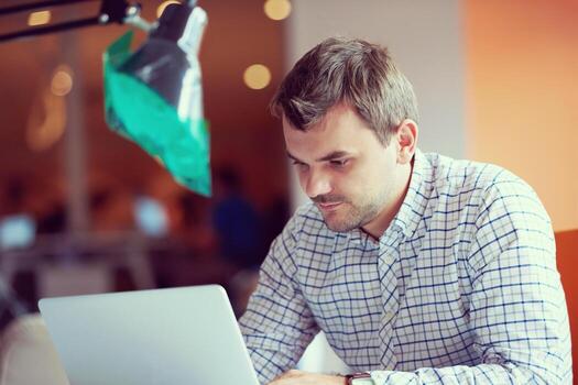 startup business, software developer working on computer photo