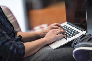 man working with laptop photo