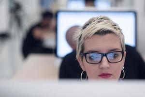 startup business, woman  working on desktop computer photo