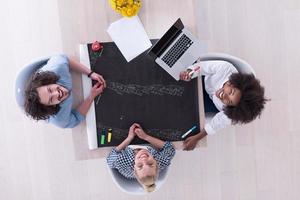 top view of Multiethnic startup business team on meeting photo