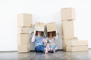 Young couple moving in new house photo