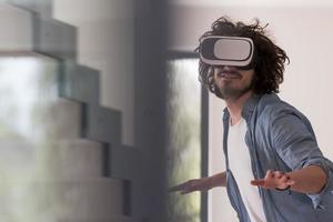 man using VR-headset glasses of virtual reality photo