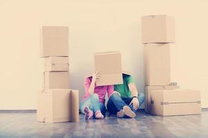 Young couple moving in new house photo