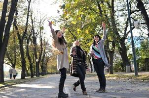 Three young ladies enjoying themselves photo