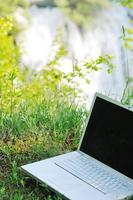 laptop on grass photo