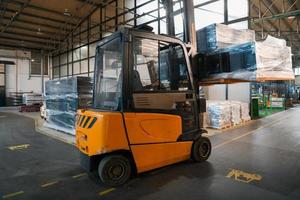 Turkey, 2022 - Forklift loader in storage warehouse ship yard. Distribution products. Delivery. Logistics. Transportation. Business background photo