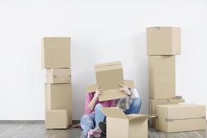 Young couple moving in new home photo