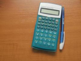 Calculator on table photo