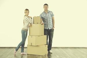 Young couple moving in new home photo