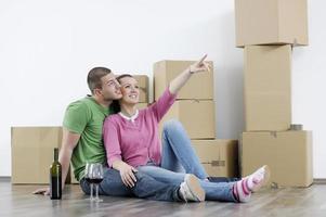 Young couple moving in new home photo