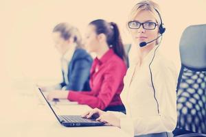 business woman group with headphones photo