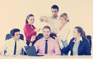 Group of young business people at meeting photo