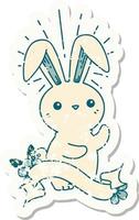worn old sticker of a tattoo style cute bunny vector