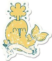 worn old sticker of a tattoo style happy squirting whale character vector