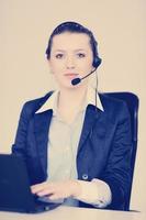 business woman group with headphones photo