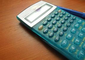 Calculator on table photo