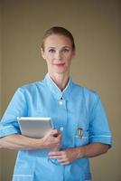 female doctor with tablet computer photo