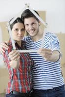 Young couple moving in new home photo