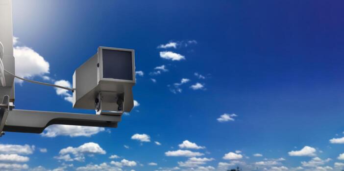 mini ip cctv camera installed on wooden pole to do the security instead of human by monitoring through mobile phone, soft and selective focus. photo