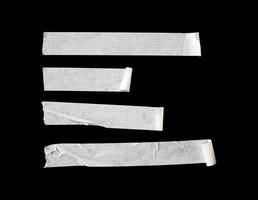 set of cream paper tape in abstract form for design element on isolated black background photo