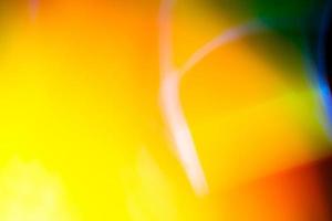 superposición de fuga de luz borrosa abstracta. fondo de textura de quemadura de película antigua de arco iris. foto