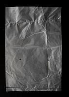 transparent plastic bag with zipper on black background for mockups photo