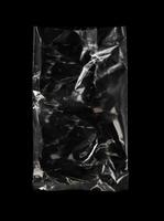 transparent plastic bag with zipper on black background for mockups photo