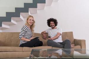 couple relaxes in the living room photo