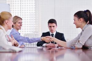 business people making deal at meeting photo