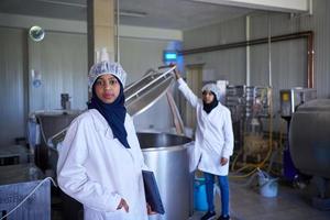 business woman team in local  cheese production company photo