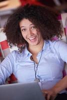 young  business woman at office photo