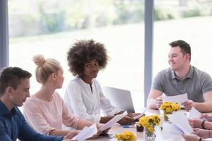 Multiethnic startup business team on meeting photo