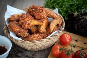 crispy fried chicken in the basket with salad photo